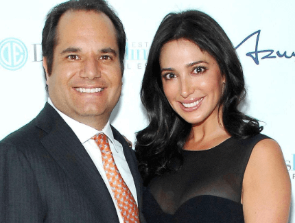 Lauren, with her former husband, Andrew Source